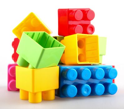 Plastic building blocks on a white background