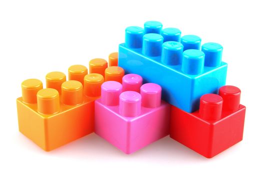 Plastic building blocks on a white background