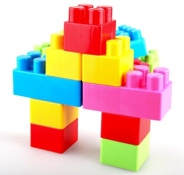 Plastic building blocks on a white background