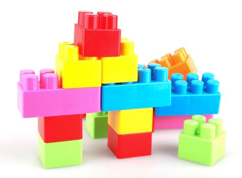 Plastic building blocks on a white background