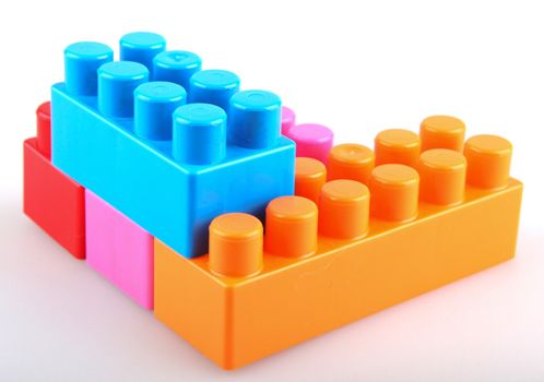 Plastic building blocks on a white background