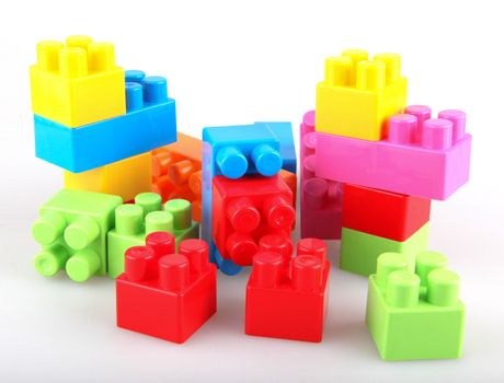 Plastic building blocks on a white background