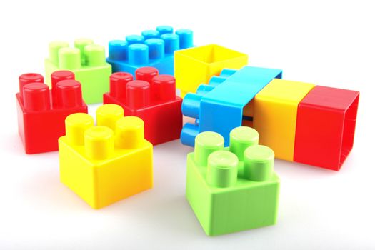 Plastic building blocks on a white background