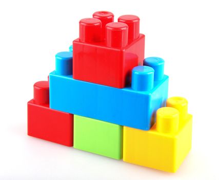 Plastic building blocks on a white background