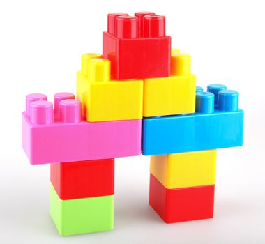 Plastic building blocks on a white background