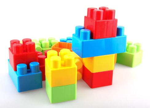 Plastic building blocks on a white background