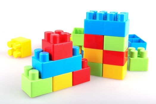 Plastic building blocks on a white background