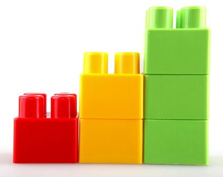 Plastic building blocks on a white background