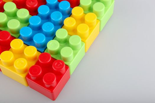 Plastic building blocks on a white background