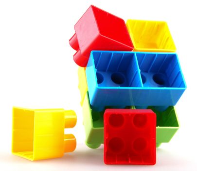 Plastic building blocks on a white background