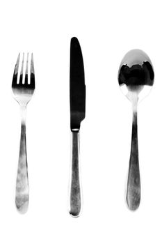 A fork, knife, and spoon on white