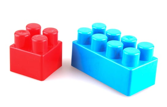 Plastic building blocks on a white background