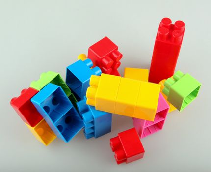 Plastic building blocks on a white background