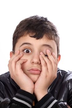 boy with bored expression on face over white