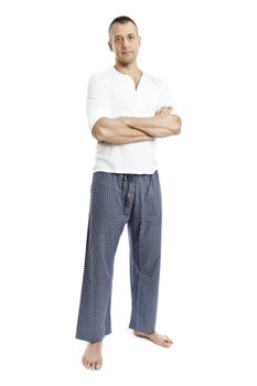 An image of a handsome man in pajamas shirtless