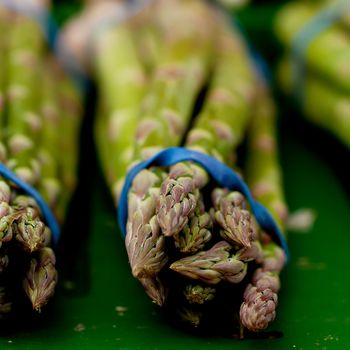 collection of fresh seasonal asparagus vegetable on market 