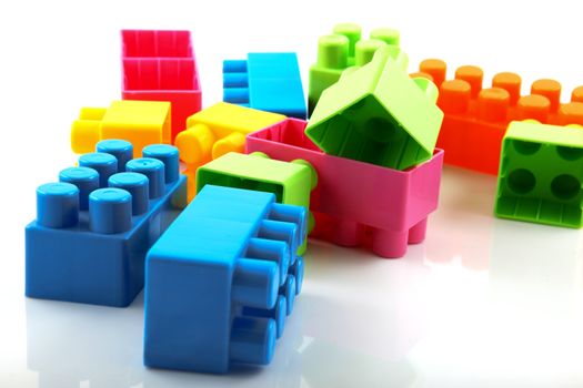 Plastic building blocks on a white background