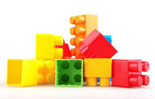 Plastic building blocks on a white background