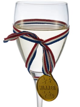 Glass of white wine with medal winner