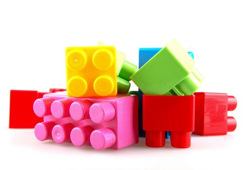 Plastic building blocks on a white background