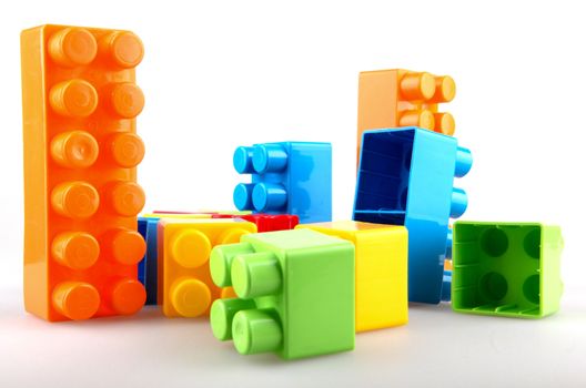 Plastic building blocks on a white background