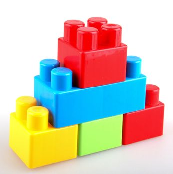 Plastic building blocks on a white background