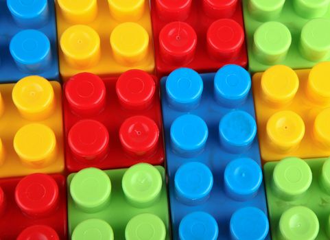 Plastic building blocks on a white background