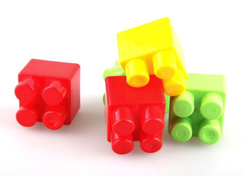Plastic building blocks on a white background