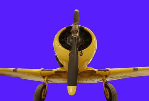 Yellow old propellered aircraft