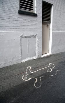 Chalk figure on the pavement