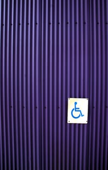 Disabled sign on a door