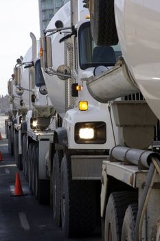 Cement trucks line up