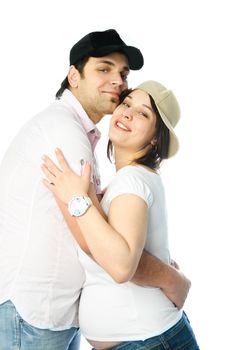 happy family, young man and his pregnant wife embracing