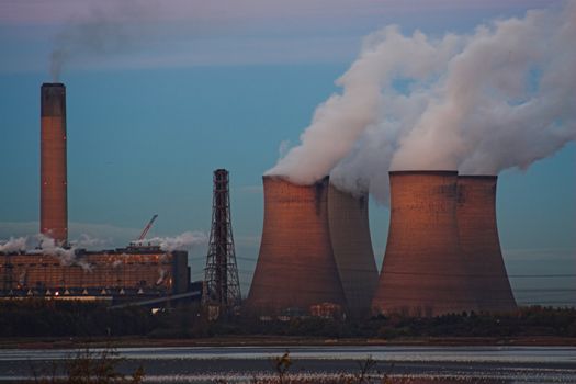 A coal powered power statiion at dusk