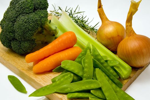 Vegetables on a chopping board ready to prepare