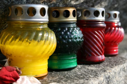 Colored candels on a historic monument close-up