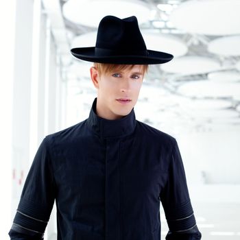 black far west modern fashion man with hat in modern indoor