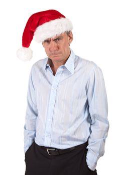 Portrait of Grumpy Frowning Angry Middle Age Business Man in Christmas Santa Hat Bah Humbug Isolated