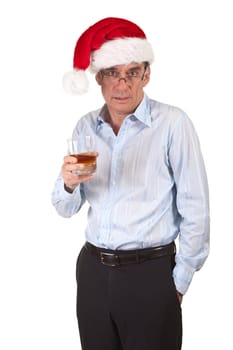 Slightly Drunk Middle Age Business Man in Christmas Santa Claus Hat Holding Drink Isolated