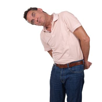 Attractive Middle Age Man Looking Sideways at Something and Surprised or Scared with Hands Behind His Back Isolated