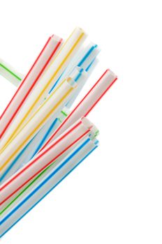 Heap of Striped Drinking Straws closeup on white background