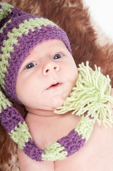 Shot of newborn baby lying on fur