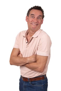 Attractive Middle Age Man Making Silly Funny Smile with Arms Folded Isolated