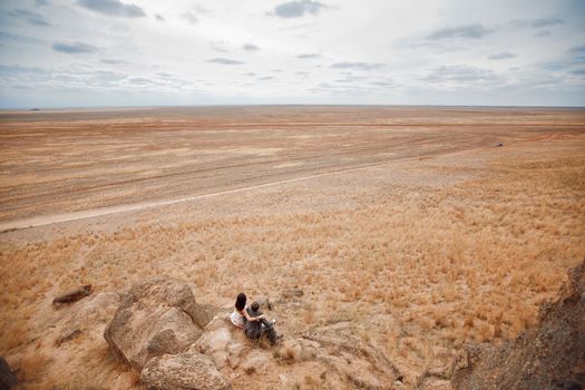 bride and groom in the mountains