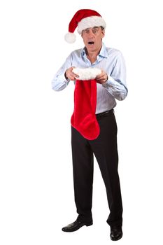 Middle Age Business Man in Santa Hat shocked at contents of Christmas Stocking Full Length Portrait Isolated