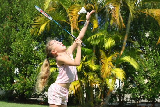 girl playing badminton