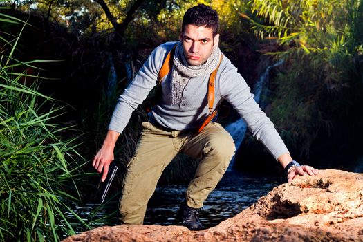 View of an treasure hunter, jungle adventurer type man.