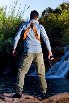 View of an treasure hunter, jungle adventurer type man.