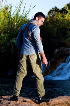 View of an treasure hunter, jungle adventurer type man.