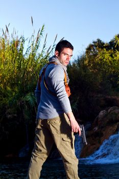 View of an treasure hunter, jungle adventurer type man.